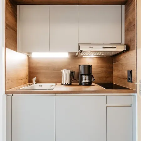 Апартаменты Appartementhaus Absmeier Бад-Фюссинг